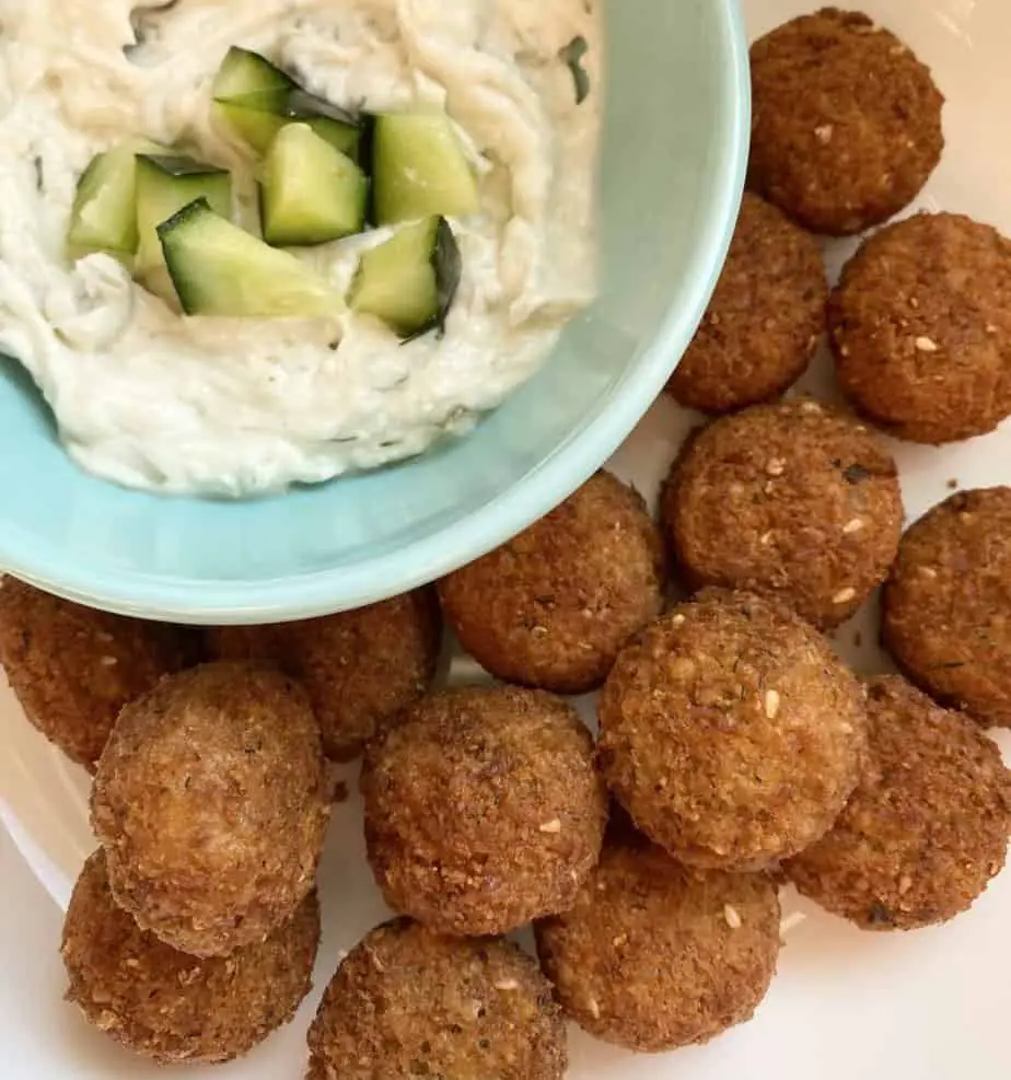 Platter of falafel with vegan tzatziki for dipping.