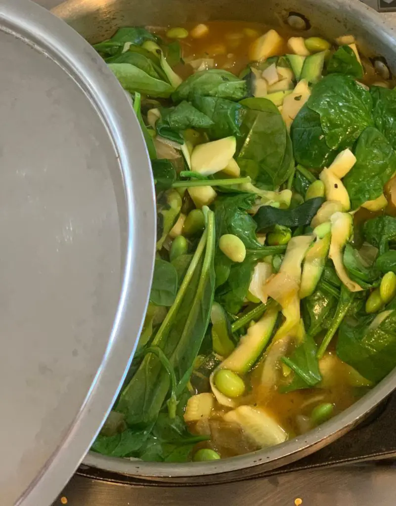 Add spinach to vegan pasta primavera.