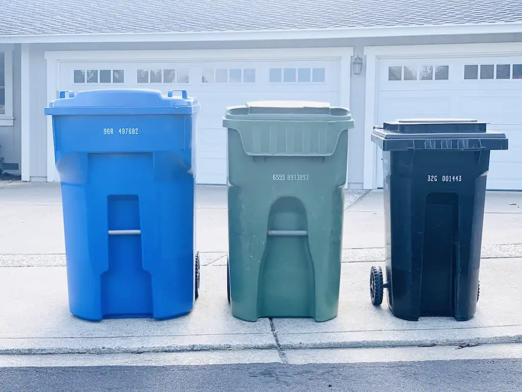 extra large recycle bin, regular size compost bin, small garbage bin