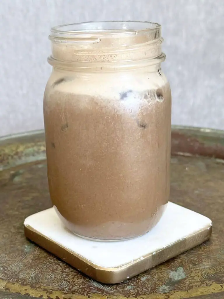 Superfood coffee smoothie recipe in a mason jar.