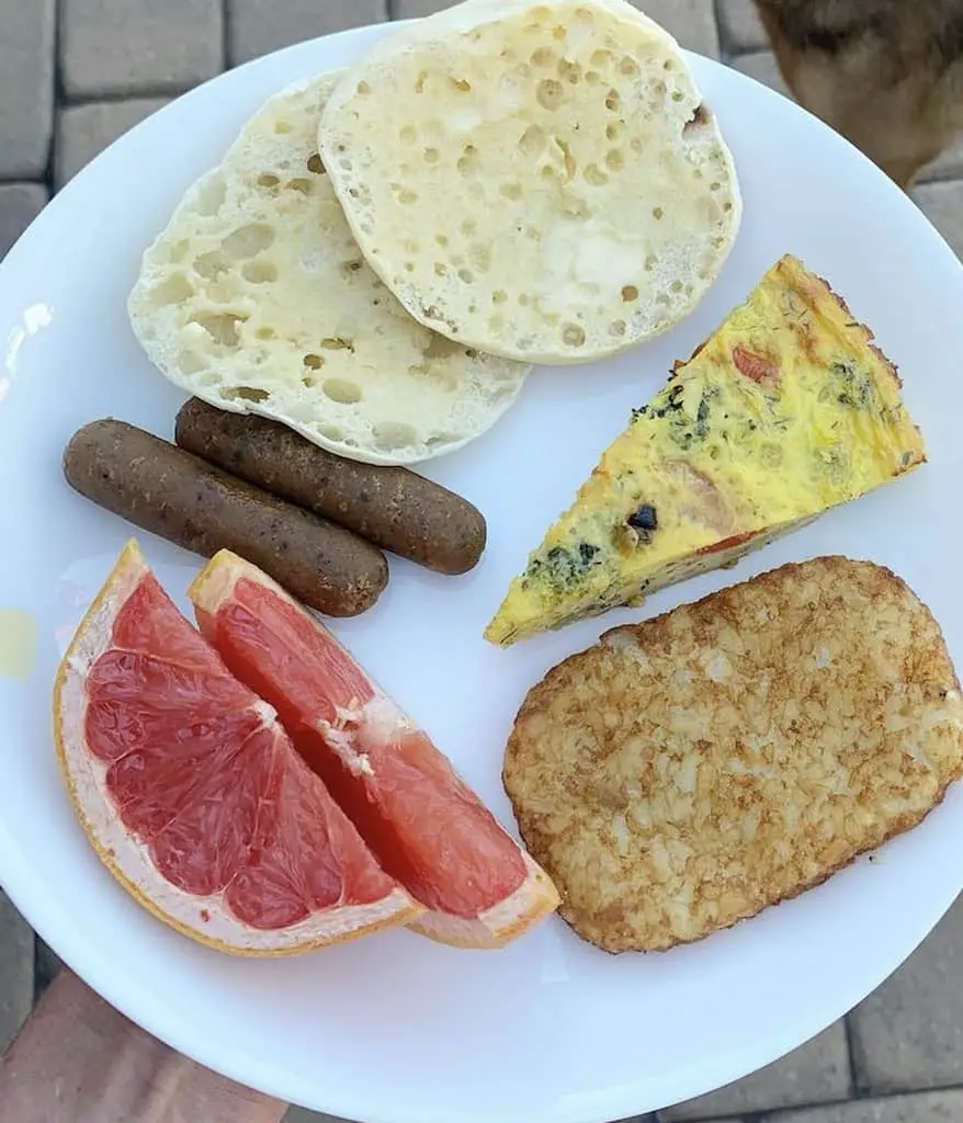 Easy JUST egg frittata with brunch spread of grapefruit, hashbrowns, vegan sausages, and English muffin.