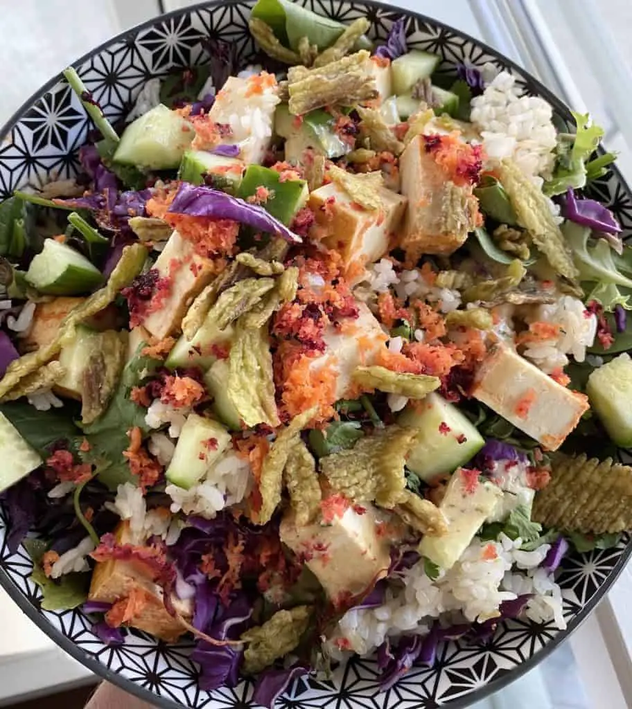 Spicy rice salad is one of the most addictive high-protein vegan salad ideas.