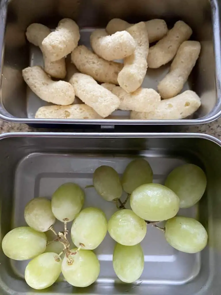 vegan cheese puffs and grapes, some healthy vegan school snacks!