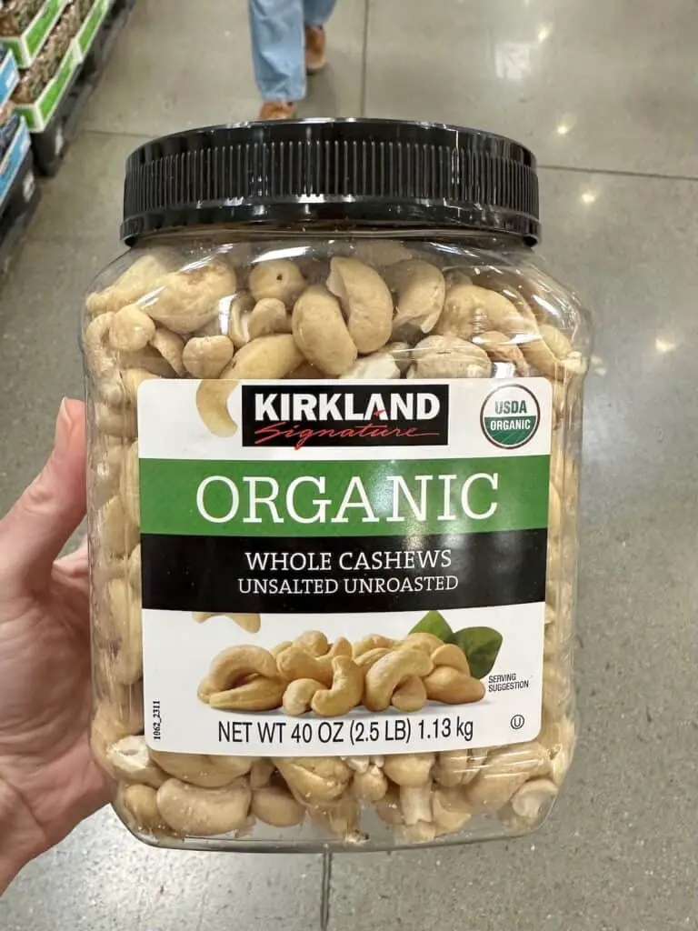 Bulk bin of organic raw unsalted cashews.