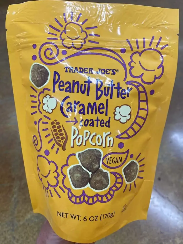 Yellow bag of vegan peanut butter caramel coated popcorn!