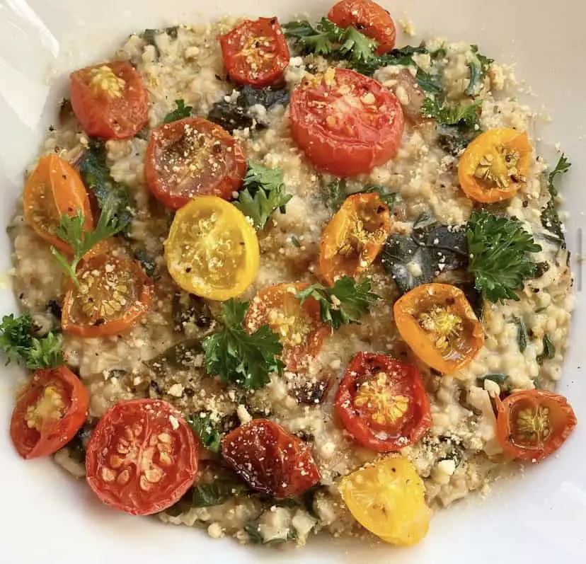 Oatmeal risotto aka savory oats with roasted tomatoes.