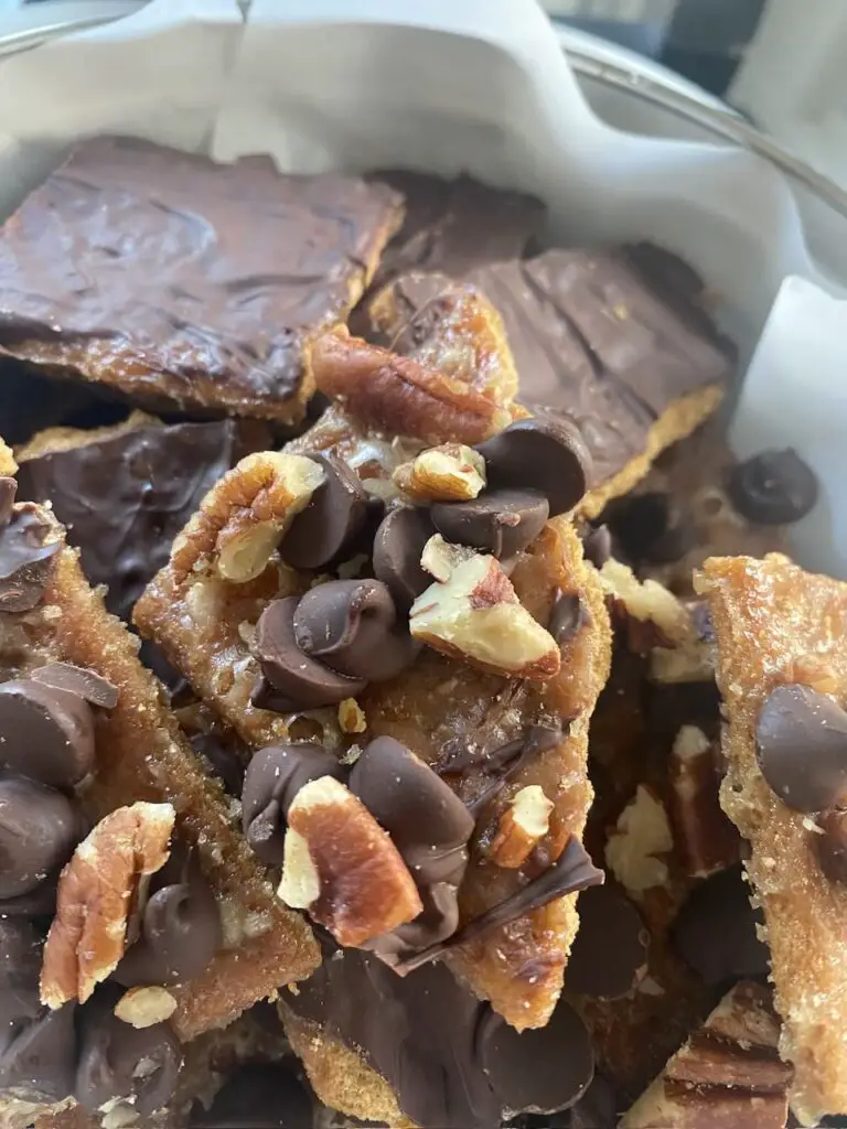 Vegan graham cracker toffee bars with semi-sweet chocolate and pecans.