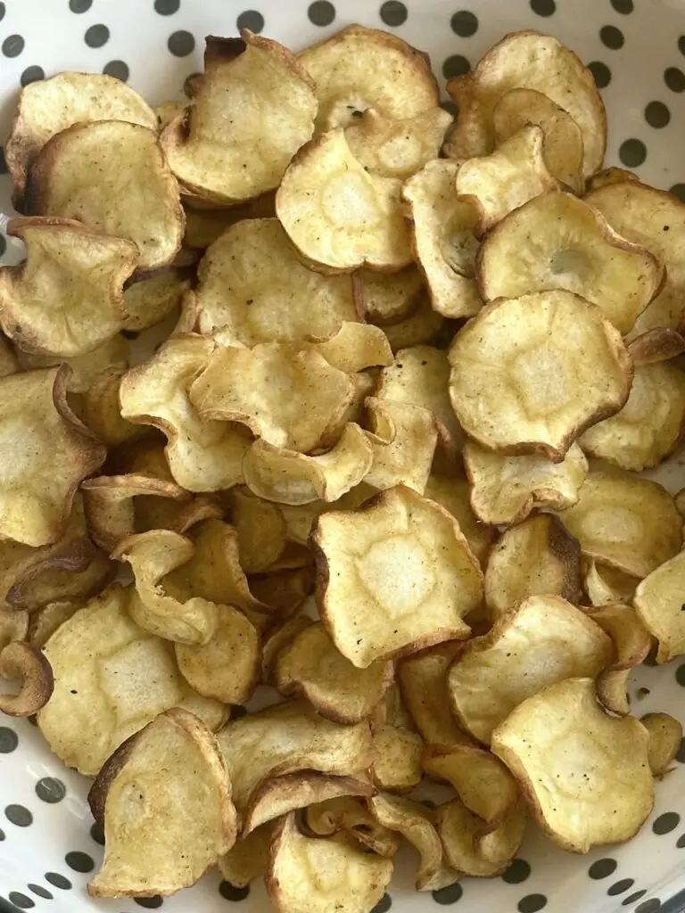 Beautiful plate full of air fryer parsnips.