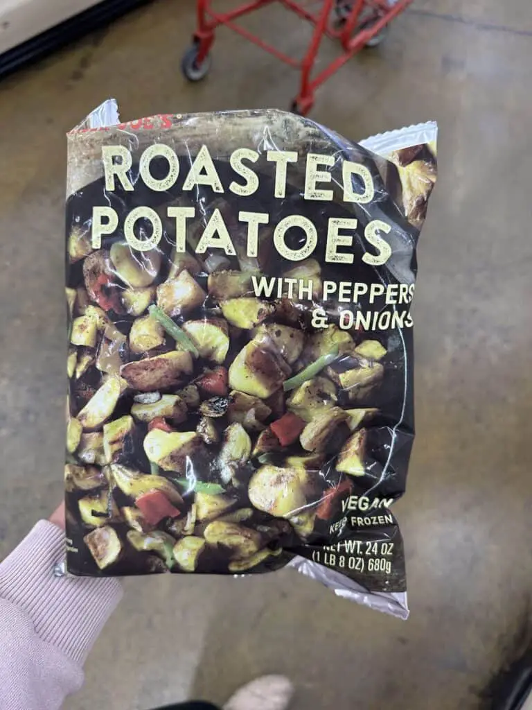 Bag of frozen roasted potatoes with peppers and onions.