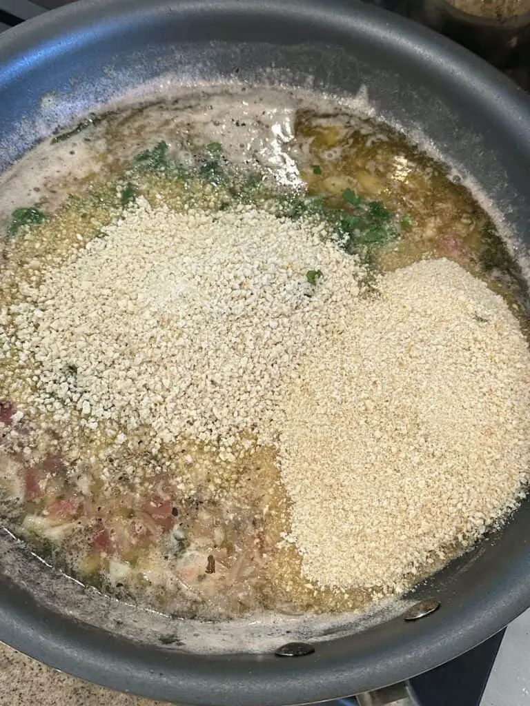Add breadcrumbs and panko to mixture.