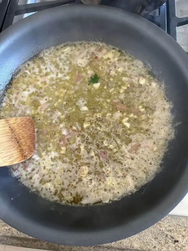 Saute shallots in butter.