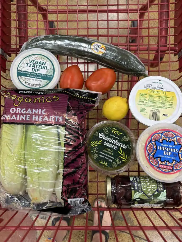 Ingredients for Greek salad in shopping cart.