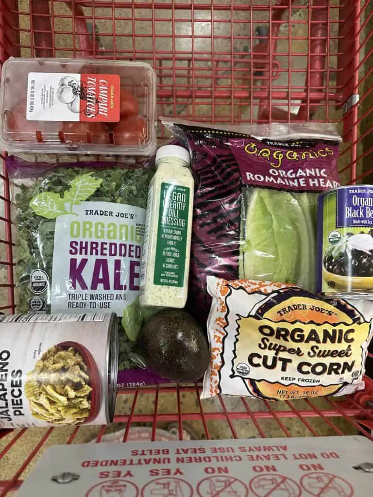 Grocery cart full of ingredients for Mexican Cobb Salad.