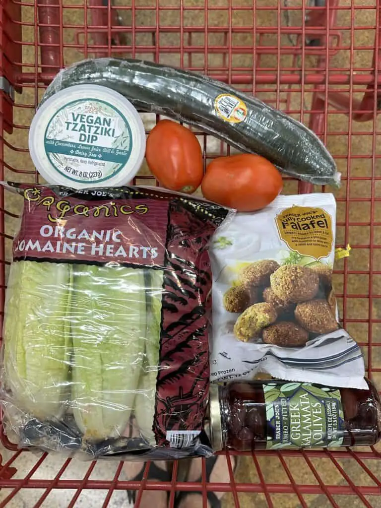 Ingredients for falafel salad in shopping cart.
