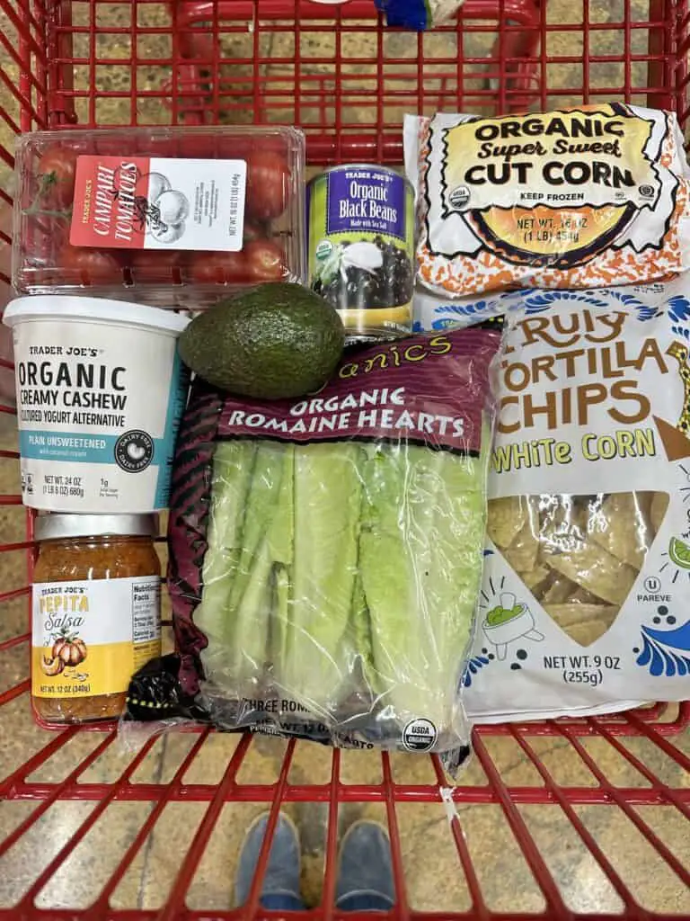 Taco salad ingredients in shopping cart.
