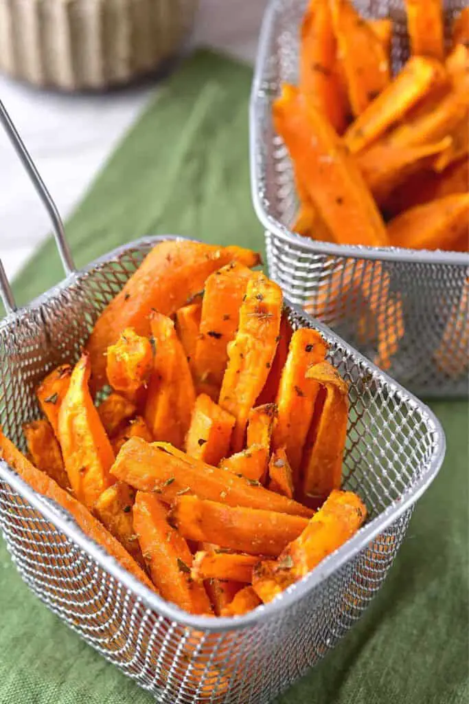 Sweet potato fries shown in a basket.