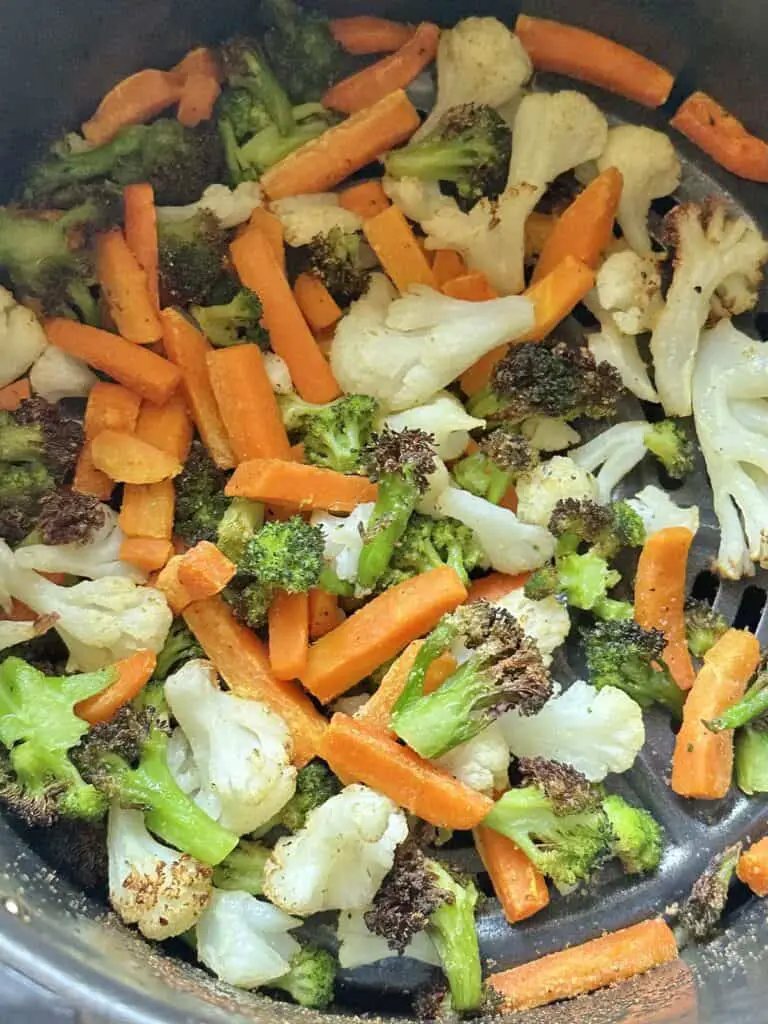 Mixed veggies done in air fryer basket.
