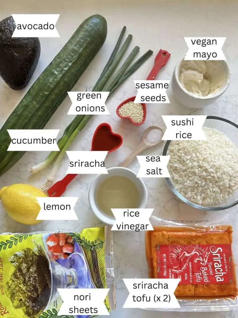 Labeled ingredients for easy vegan sushi bake, on top of white kitchen counter.