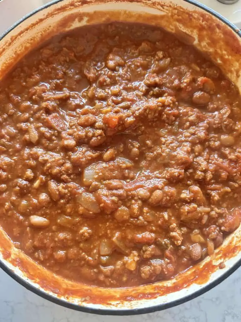 Close up of the pot of killer vegan chili with Impossible meat in Dutch oven!