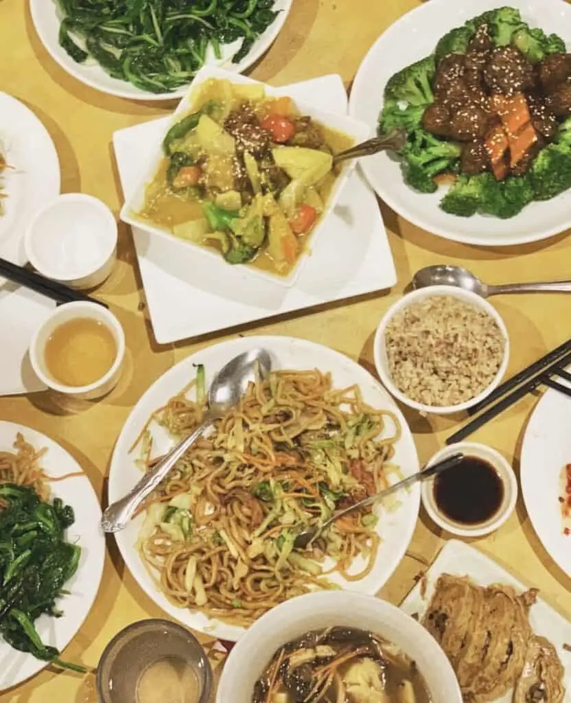 Assortment of vegan Chinese dishes at Enjoy Vegetarian restaurant.